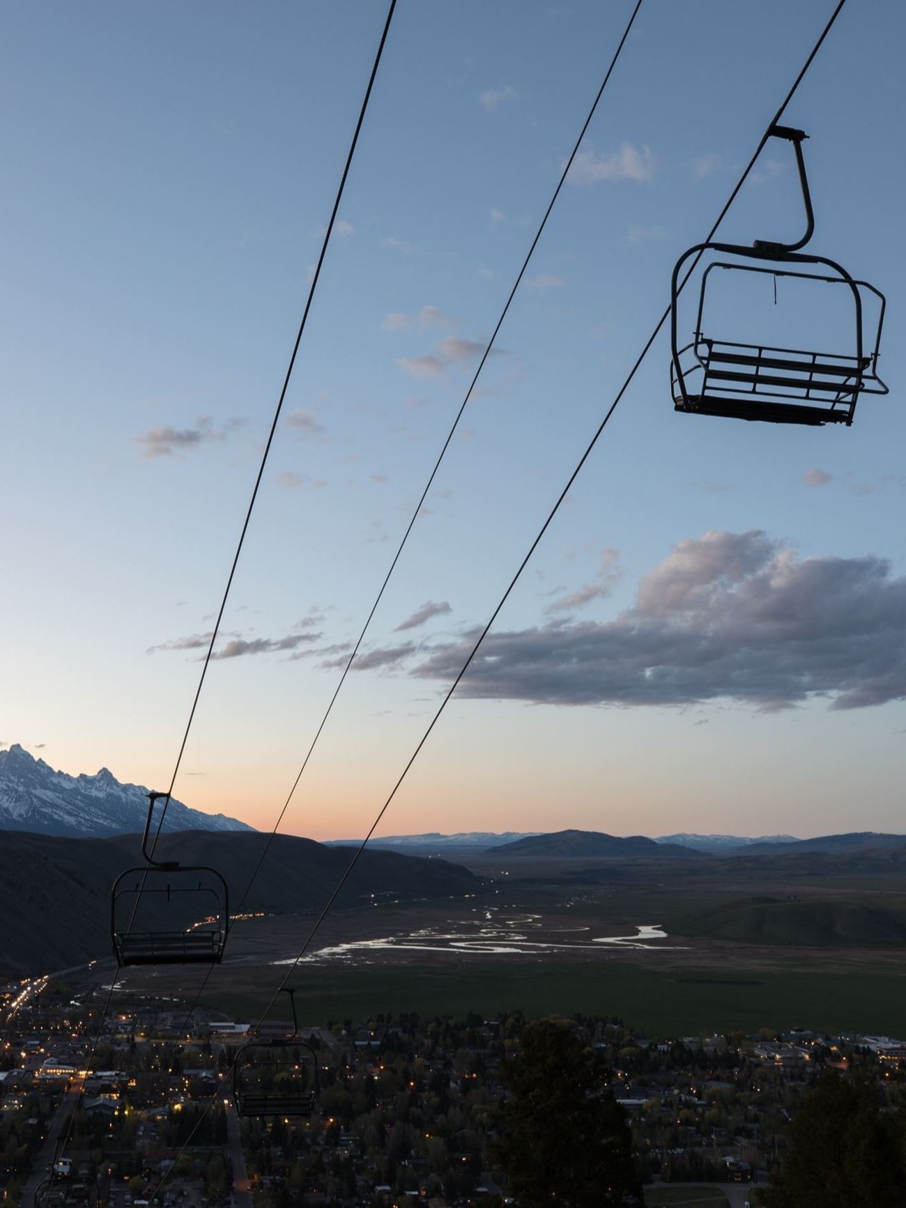 Snow King chairlift sunset with tetons